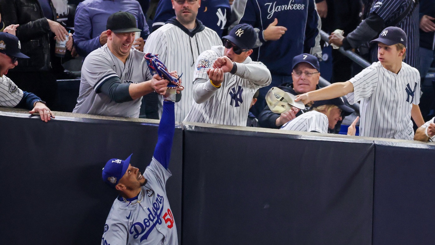 Yankees fans grabbed for Mookie Betts' ball. MLB fan interference isn't new : NPR