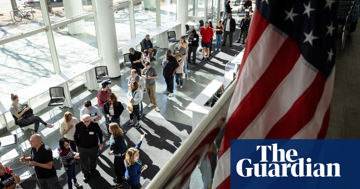 Americans head to polls with historic election on a knife edge | US elections 2024