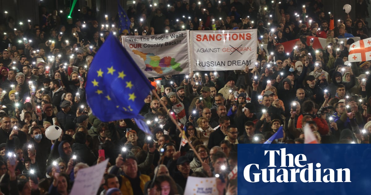 Protests in Georgia over disputed vote as PM threatens to ban opposition | Georgia