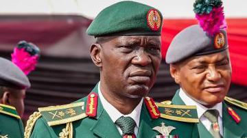 Nigeria's Chief of Army General Taoreed Lagbaja wearing a green military suit with gold army regalia