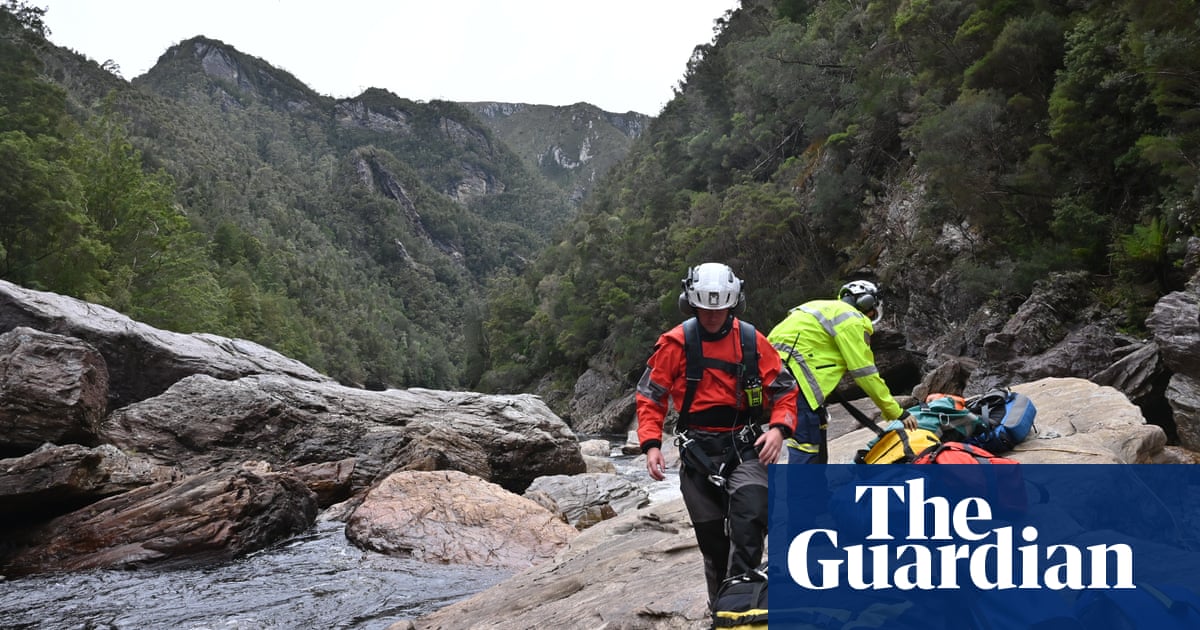 ‘He was wedged like an hourglass’: rescuers describe 20-hour ordeal ending with amputation of rafter’s leg | Australia news