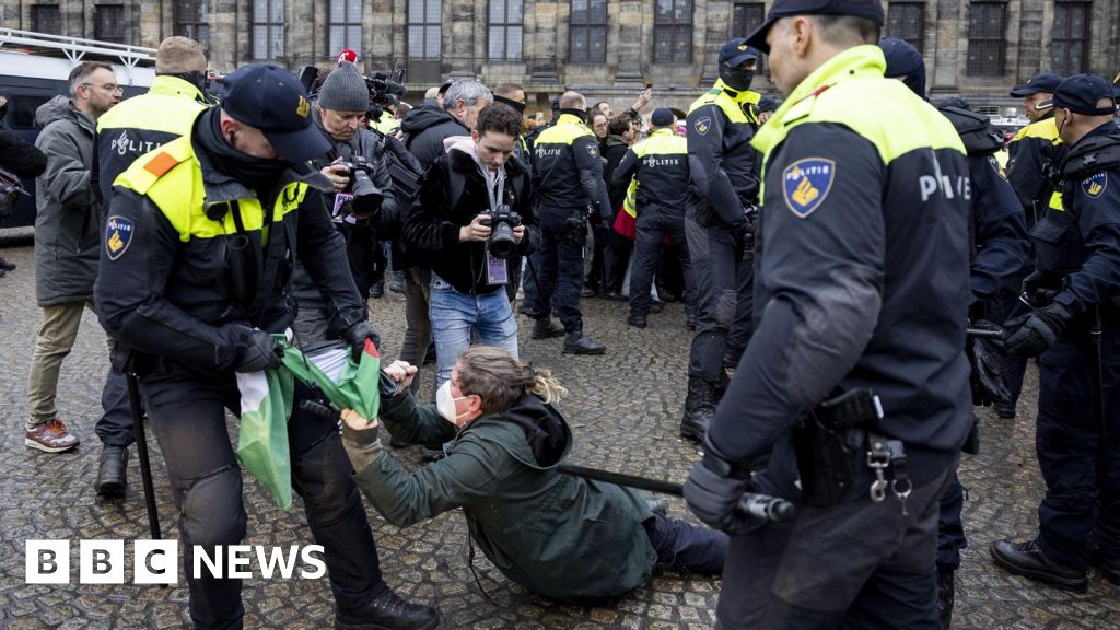 Dozens detained after protesters defy mayor's ban