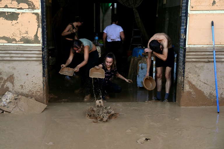 Officials say dozens remain missing after flooding that claimed at least 158 lives in Spain (JOSE JORDAN)