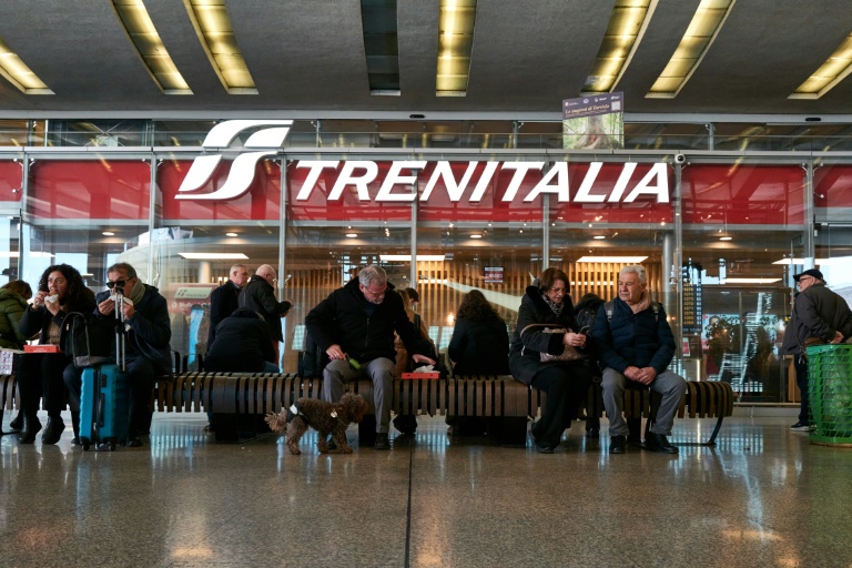 Italian train operator Trenitalia left many passengers behind when it had a train depart nearly an hour early to arrive on time (Andreas SOLARO)