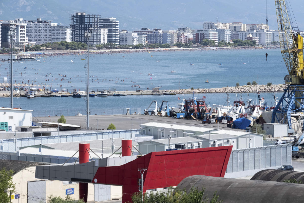 Italian ship takes migrants to Albania in 2nd test of deal to process claims outside the EU