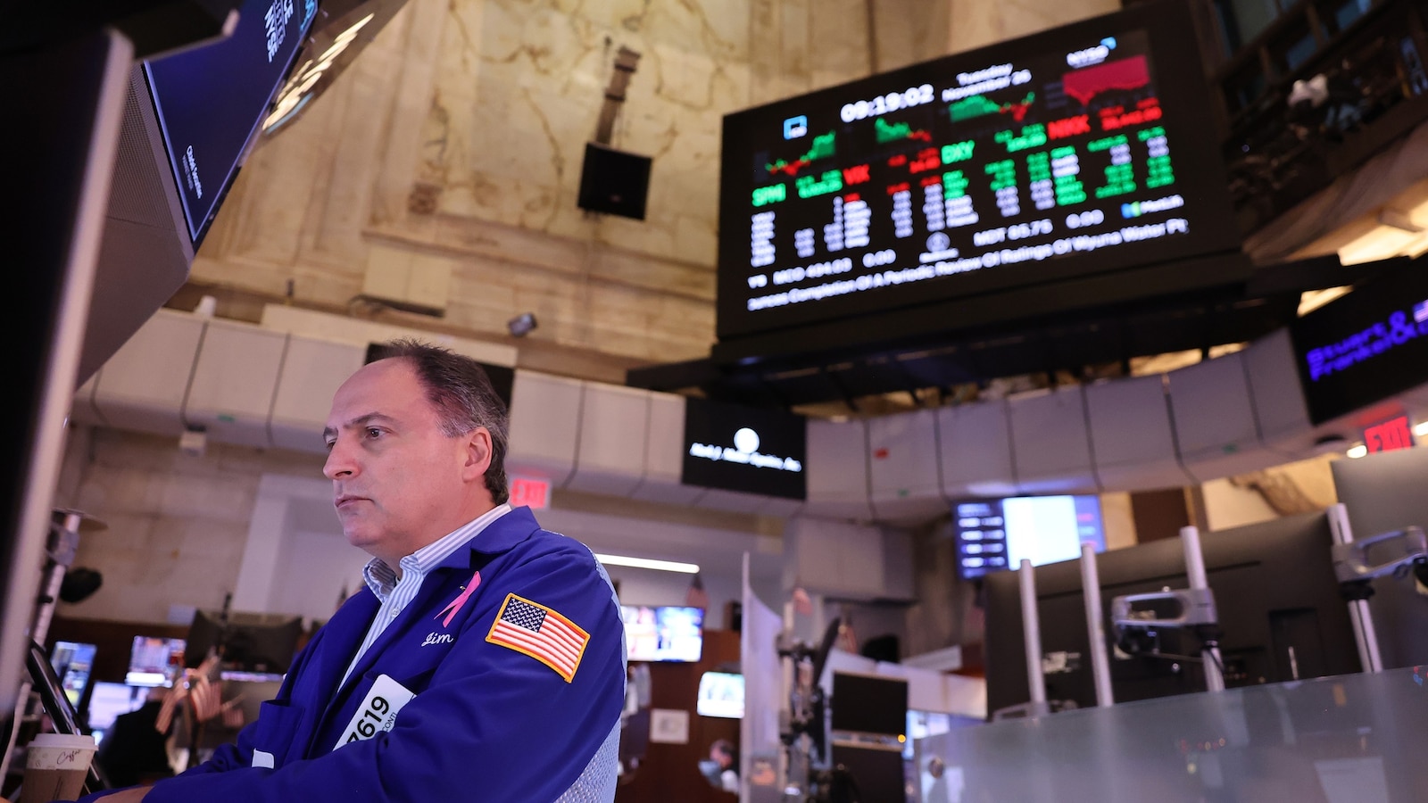 Dow closes at record high, defying fears of panic sparked by Trump's tariff threat