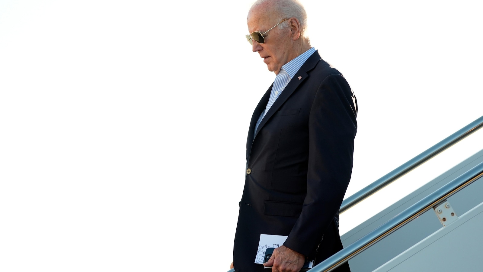 Biden suggests he'd like to smack 'macho guys' during final campaign stop